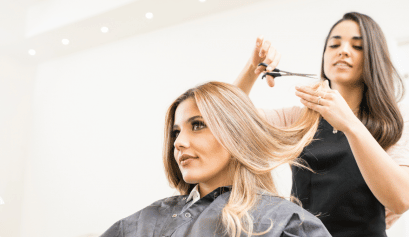 A stylist cuts her friend's hair for free while pondering the pros and cons of family and friend discounts.