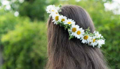 A client is wearing her Easter-inspired look from her beauty pro, a gorgeous flower crown.