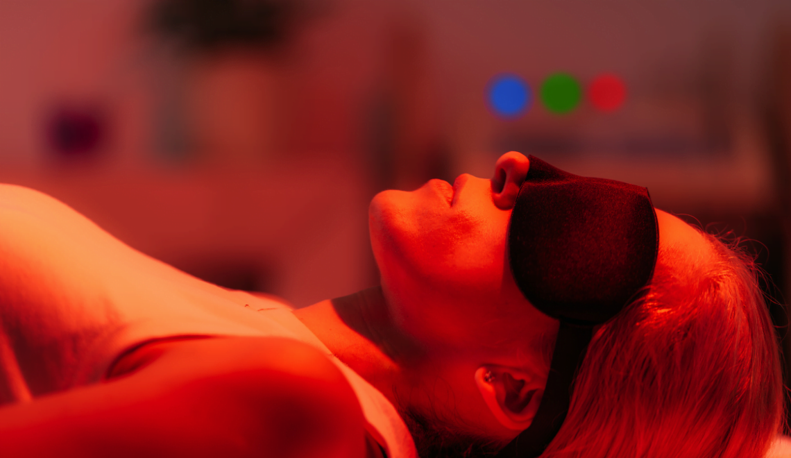 A client undergoes a round of light therapy treatment, a new offering at her favorite salon.
