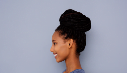 Smiling to herself, a cosmetologist thinks about her occurrence form coverage.
