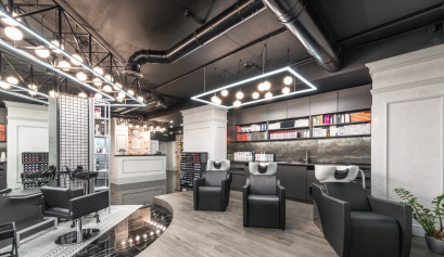 An empty salon awaits clients as the stylists who run it contemplate how to raise their beauty pro prices.