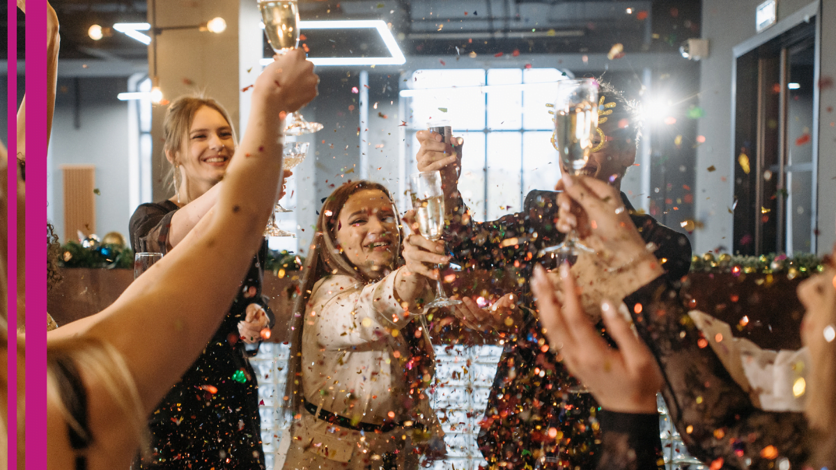 A group of beauty pros cheers in celebration for beauty and barber week.