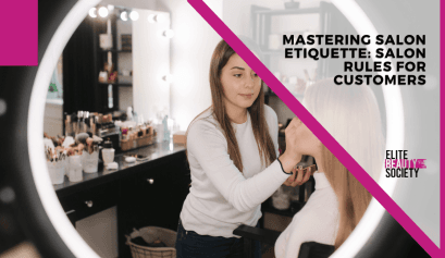 Makeup artist applying makeup in a salon, demonstrating salon etiquette and the importance of customer rules.
