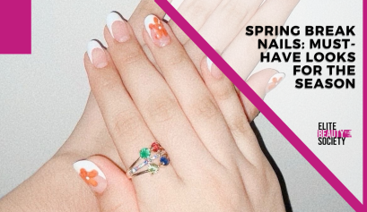 Dainty flowers are painted on a client's nails for spring break nails.